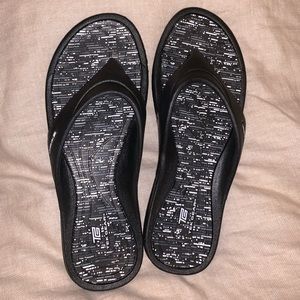 Black flip flops by Tek Gear never worn